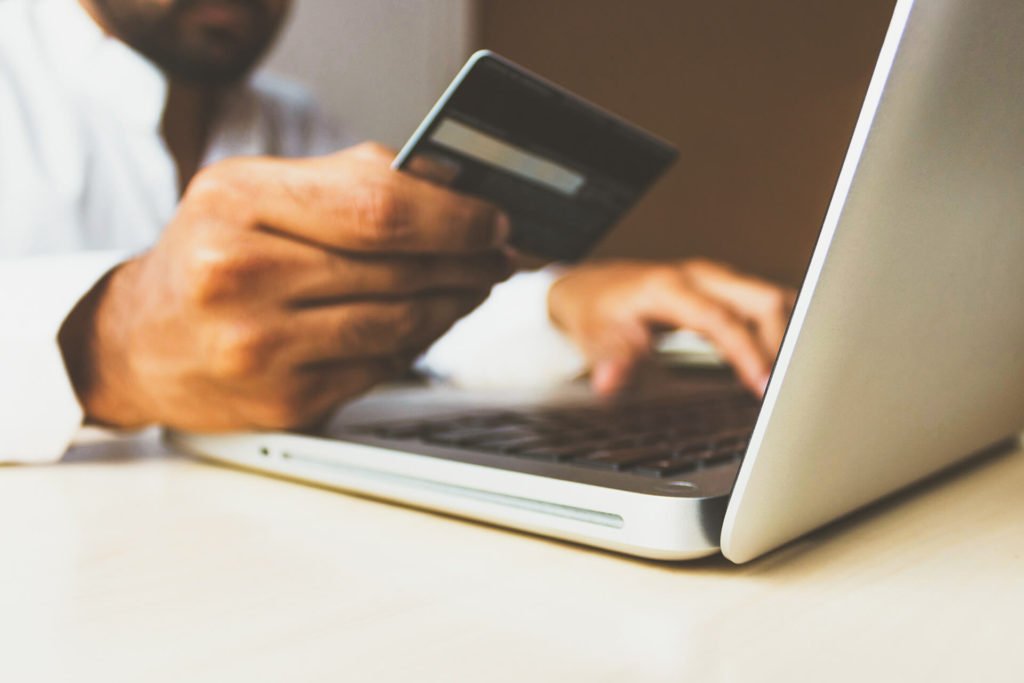 Man shopping online for holiday deals