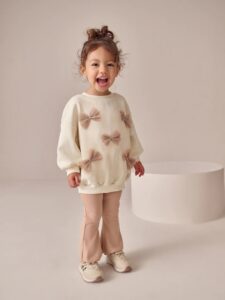 Image of sale on Cream Bow Sweatshirt & Flare Leggings Set (3mths-7yrs)